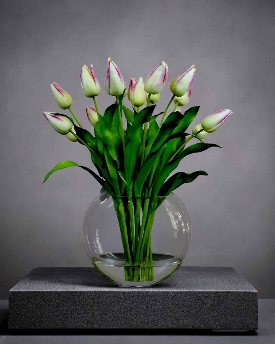 Waterlook Tulips in Halfmoon Glass Vase