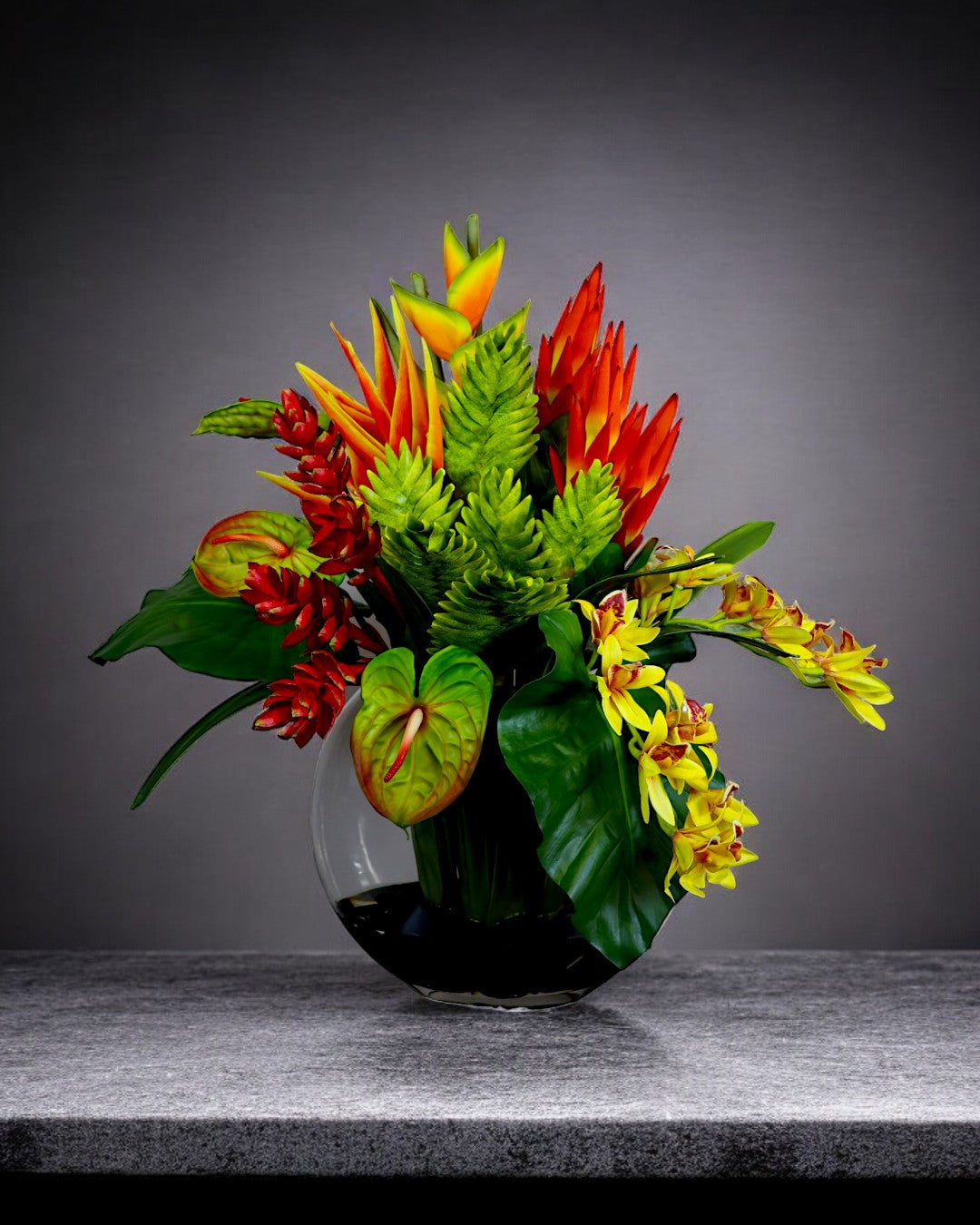 Waterlook Tropical Arrangement in Glass Halfmoon Vase