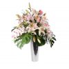 Casablanca Lilies, orchids and roses in silvel looc vase